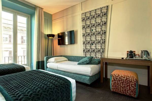 Deluxe triple room Mascagni Luxury Rooms & Suites**** in ROME