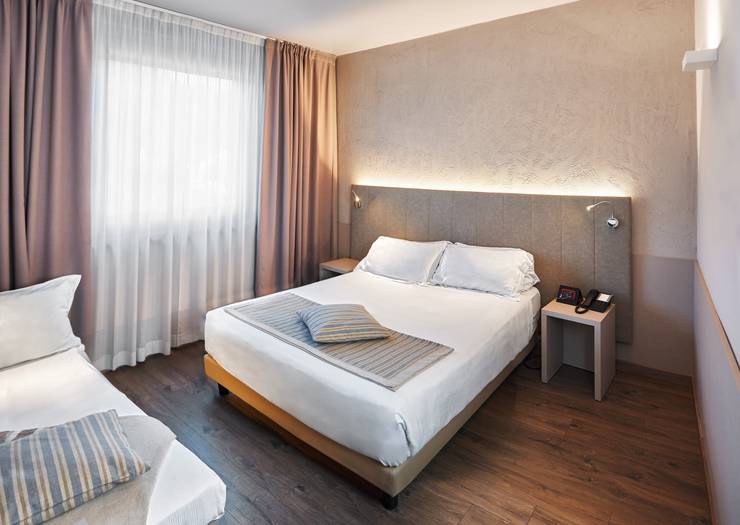 Camera superior tripla First Hotel Malpensa**** MILANO-MALPENSA Camera superior tripla First Hotel Malpensa**** MILANO-MALPENSA